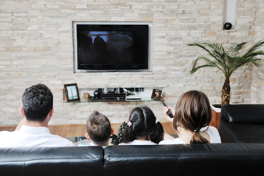 family watching home cinema