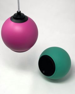 2 halo speakers in green and pink